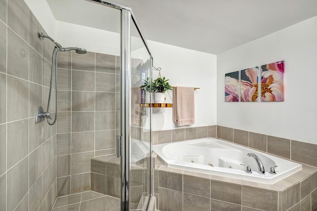 bathroom with shower with separate bathtub