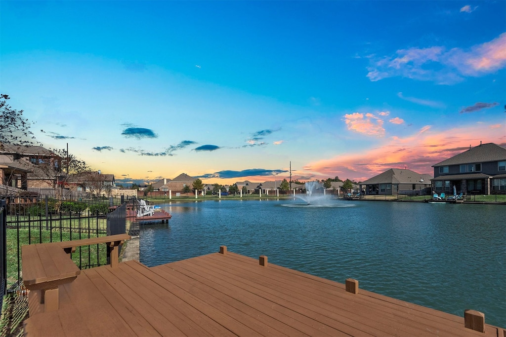 dock area featuring a water view