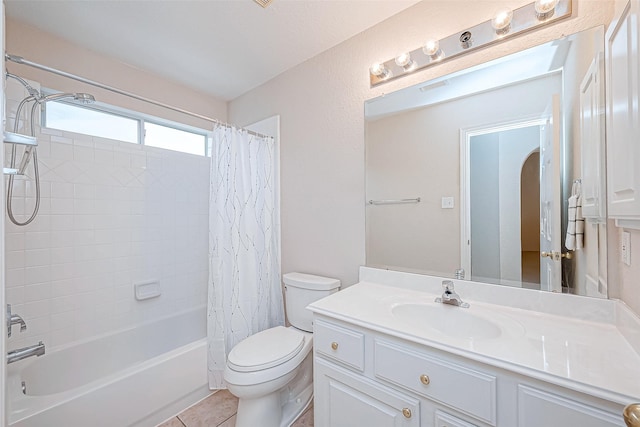 full bathroom featuring toilet, tile patterned flooring, shower / bathtub combination with curtain, and vanity