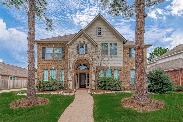 view of front of home with a front lawn