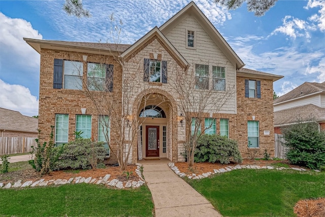 view of front of house featuring a front lawn