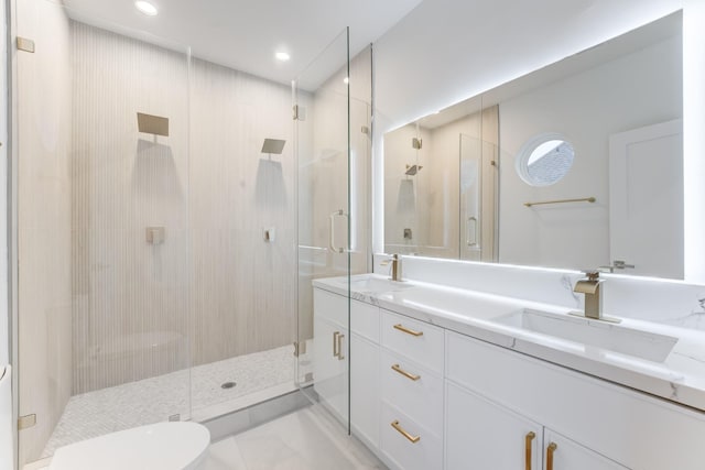 bathroom with tile patterned floors, vanity, toilet, and an enclosed shower