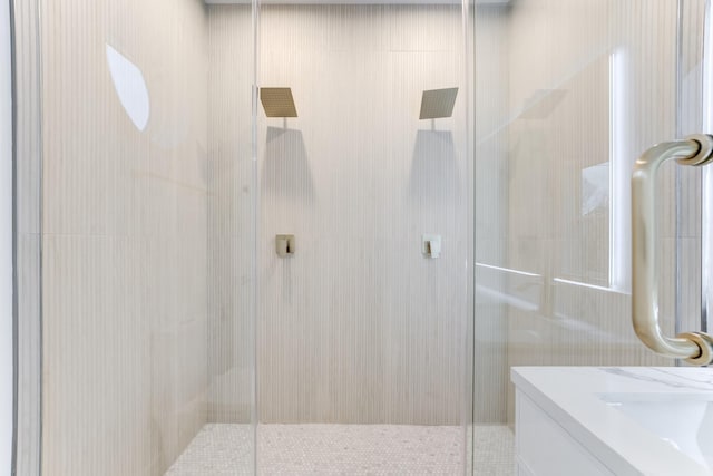 bathroom with vanity and an enclosed shower