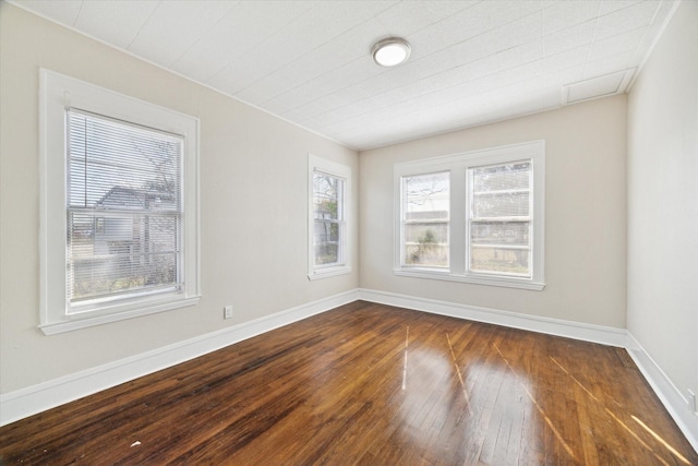 unfurnished room featuring dark wood-type flooring