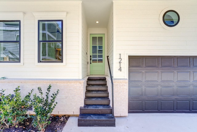 entrance to property with a garage