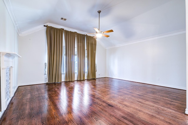 unfurnished living room featuring ceiling fan, vaulted ceiling, dark hardwood / wood-style floors, and crown molding