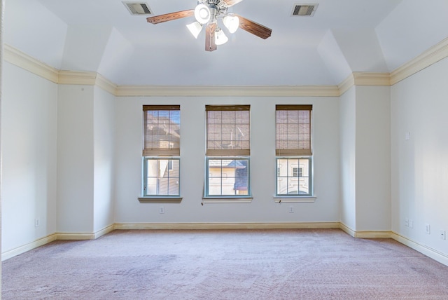 carpeted empty room featuring ceiling fan and vaulted ceiling