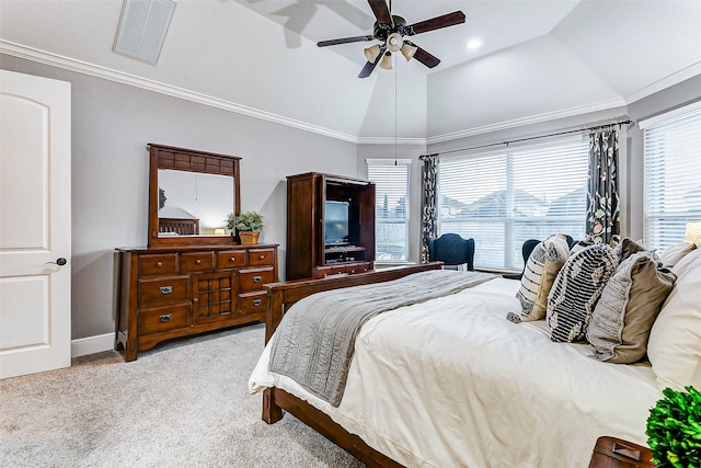 bedroom with ceiling fan, multiple windows, light carpet, and lofted ceiling