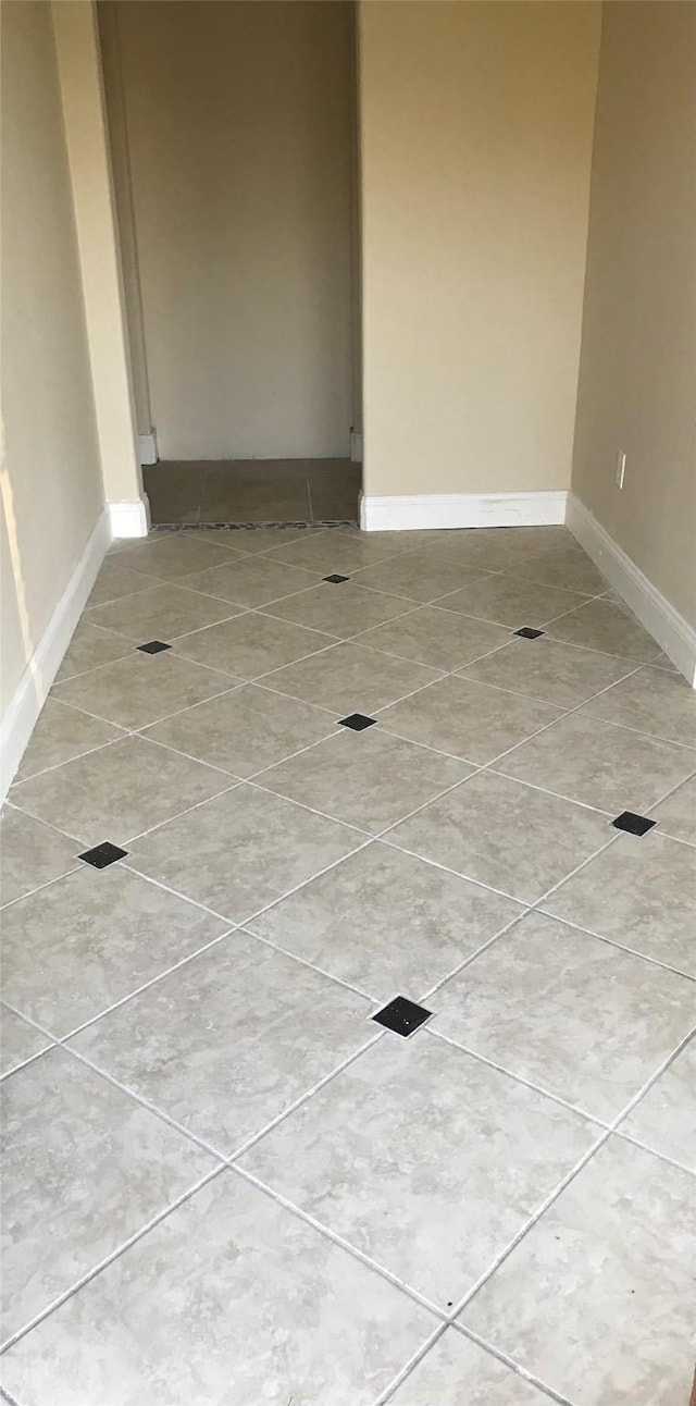 view of tiled spare room