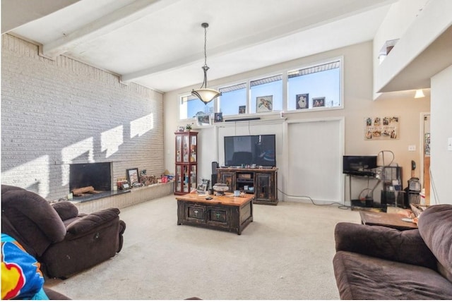 carpeted living room with a fireplace, brick wall, beam ceiling, and a high ceiling