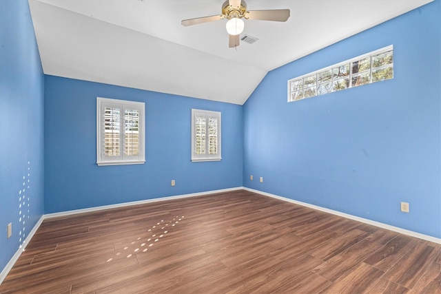 unfurnished room with wood-type flooring, lofted ceiling, and ceiling fan