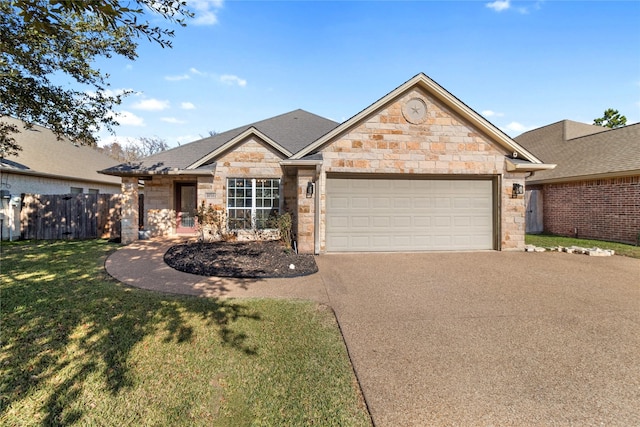 view of front facade featuring a front yard and a garage