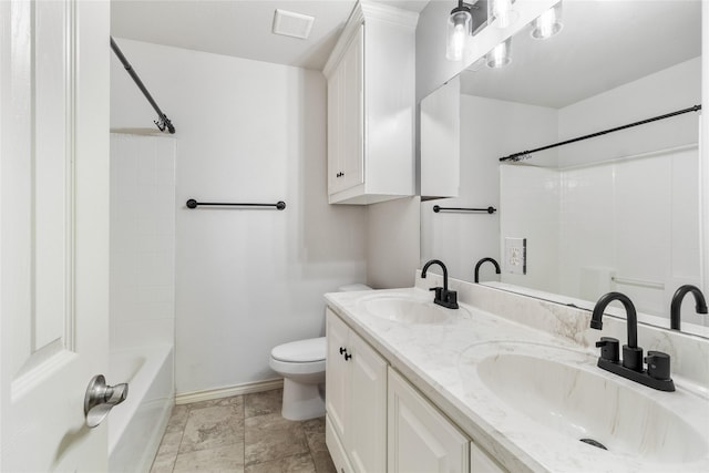 full bathroom with toilet, vanity, and shower / bathing tub combination