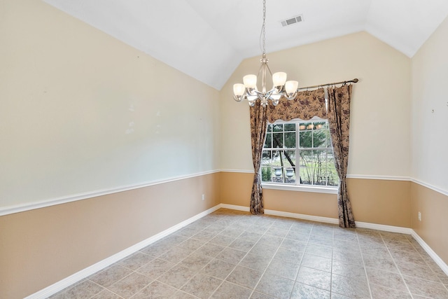 unfurnished room featuring lofted ceiling and a notable chandelier