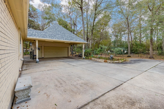 view of patio / terrace featuring a garage