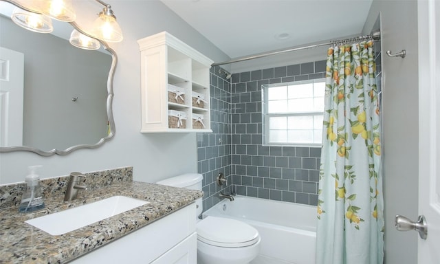 full bathroom with toilet, shower / tub combo, and vanity