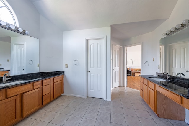 bathroom featuring vanity and tile patterned flooring