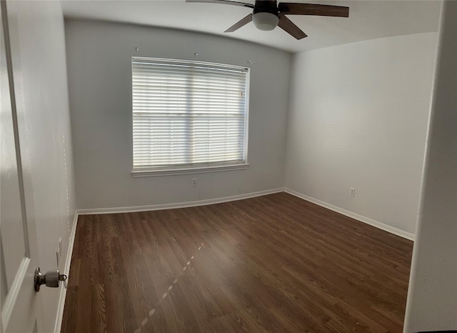 unfurnished room featuring ceiling fan and dark hardwood / wood-style flooring