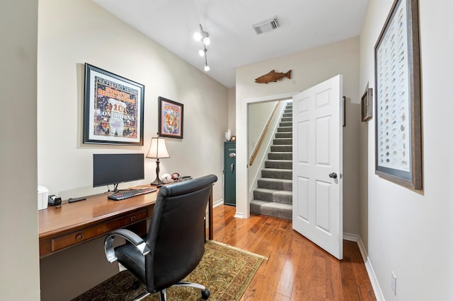 office space featuring hardwood / wood-style floors