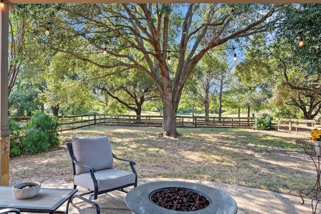 view of yard featuring a fire pit