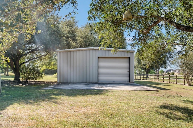 garage with a lawn