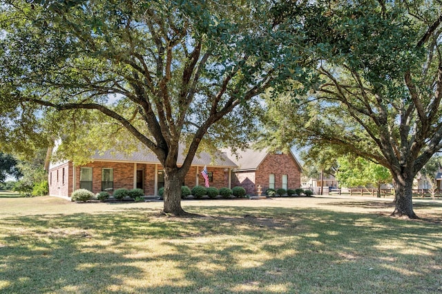 view of front of property with a front lawn