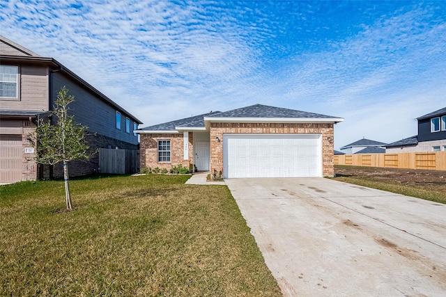 view of front facade featuring a garage and a front yard