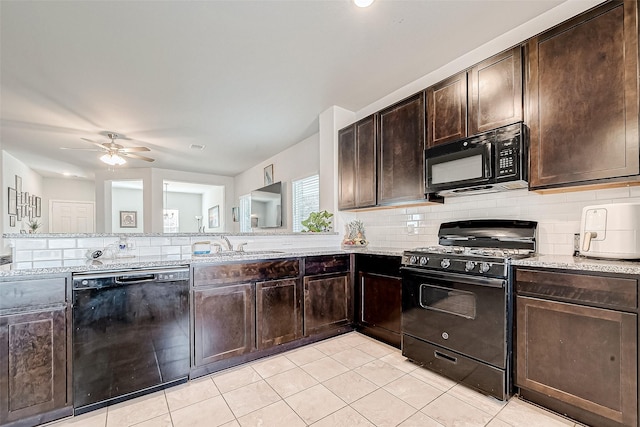 kitchen featuring ceiling fan, backsplash, light stone counters, dark brown cabinetry, and black appliances