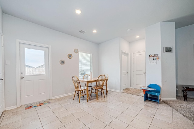 dining room with light tile patterned flooring