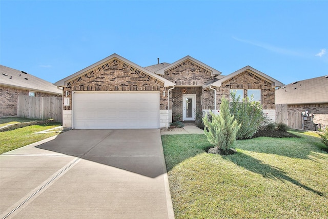 single story home with a garage and a front lawn