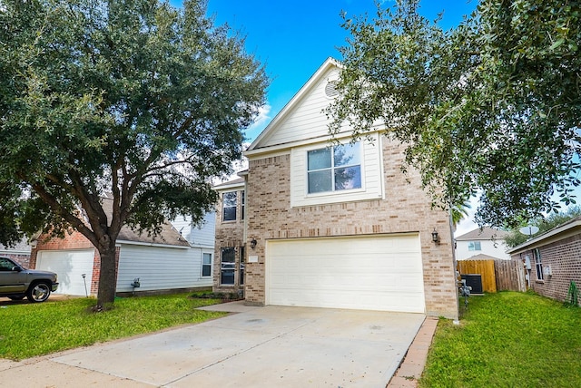 front facade with a front lawn and a garage