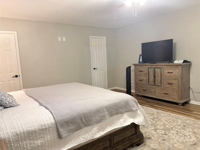 bedroom with wood-type flooring