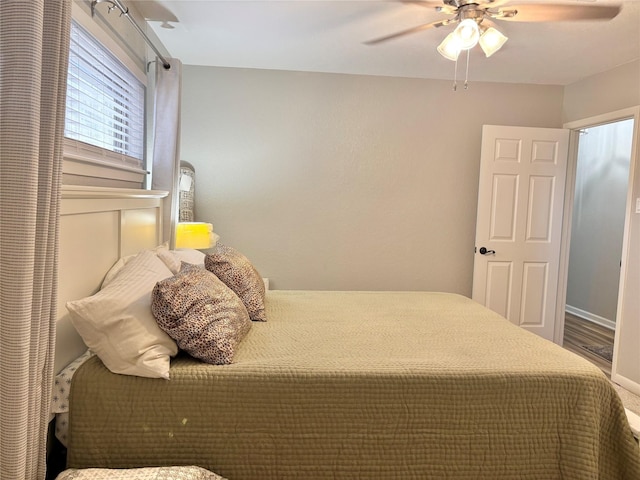 bedroom featuring ceiling fan