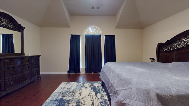 bedroom featuring dark hardwood / wood-style floors