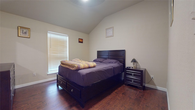 bedroom with dark wood-type flooring and vaulted ceiling