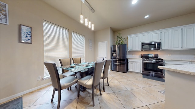 tiled dining area with plenty of natural light