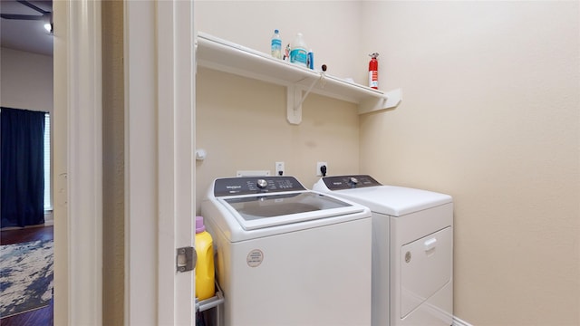 washroom with separate washer and dryer