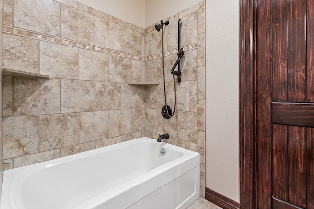 bathroom featuring washtub / shower combination