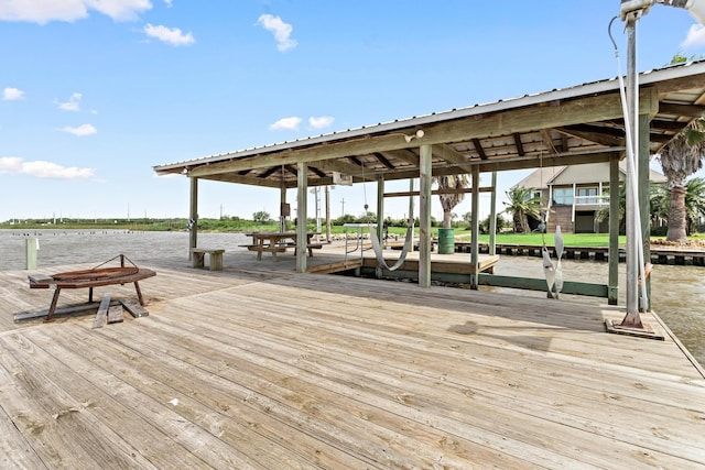 view of dock with a water view