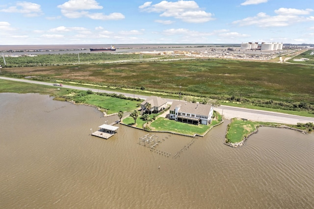 drone / aerial view featuring a rural view and a water view