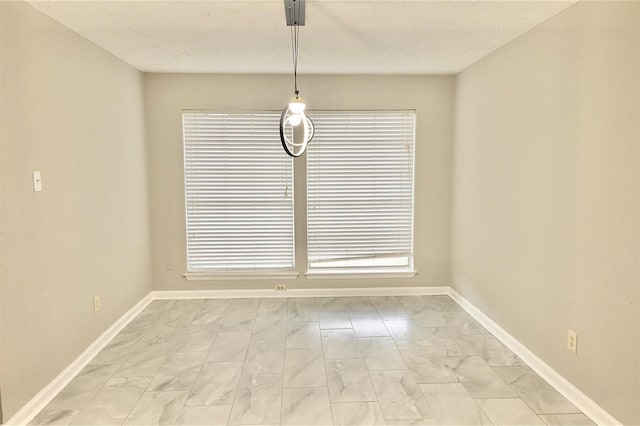 view of unfurnished dining area