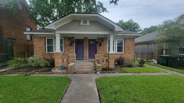 view of front of property with a front lawn