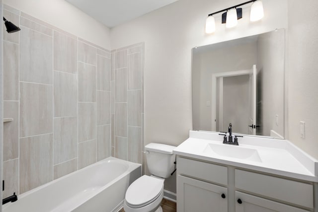 full bathroom featuring toilet, vanity, and bathtub / shower combination