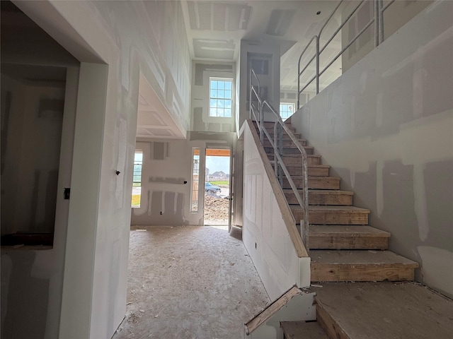 stairs with a towering ceiling