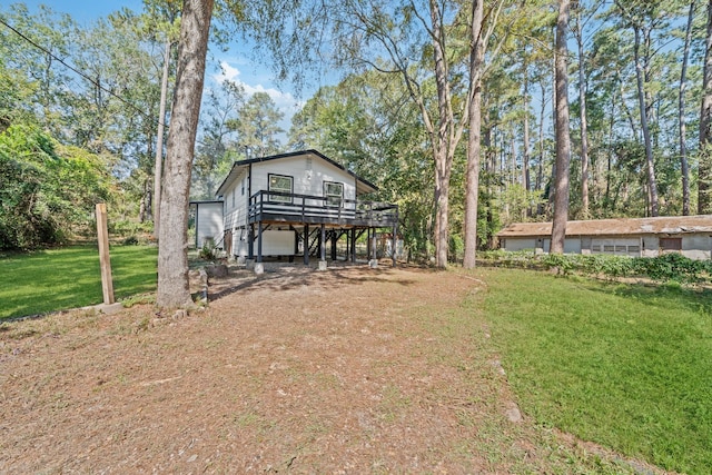 view of yard featuring a deck