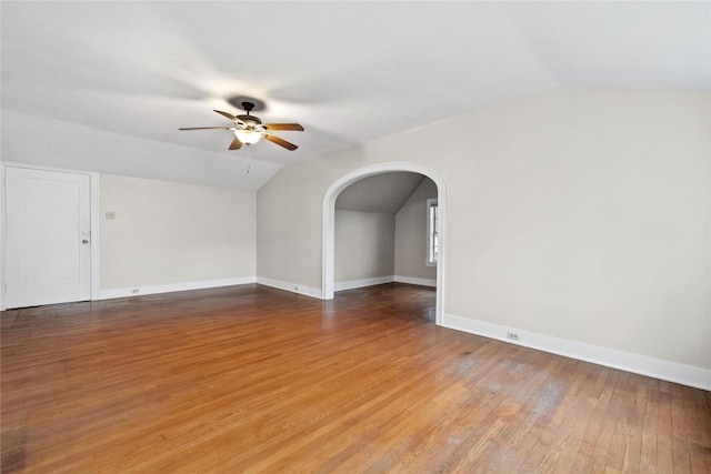 bonus room with lofted ceiling, ceiling fan, and wood-type flooring