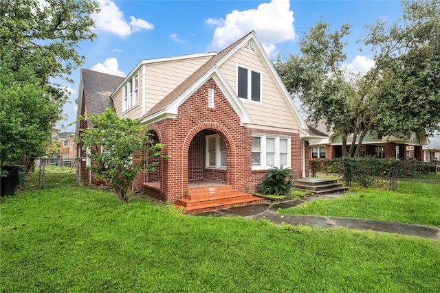 view of front of property with a front lawn