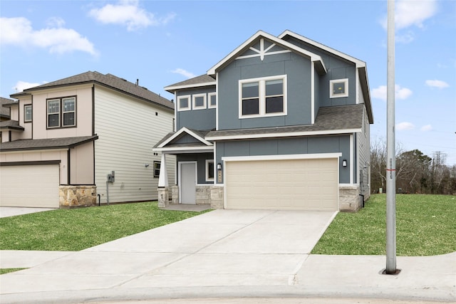 view of front of property with a front lawn and a garage