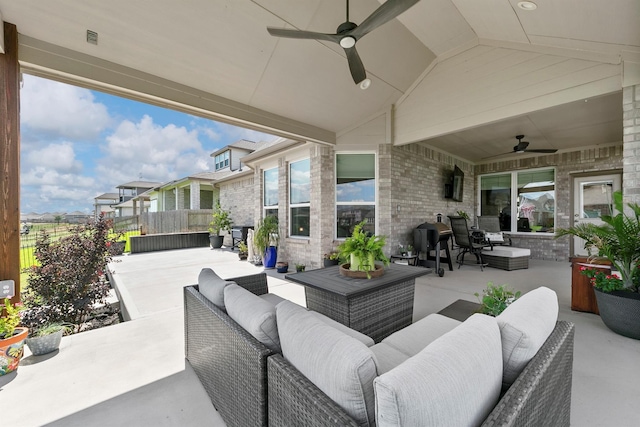 view of patio featuring ceiling fan and an outdoor living space