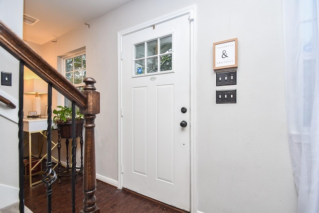 foyer with dark wood-type flooring